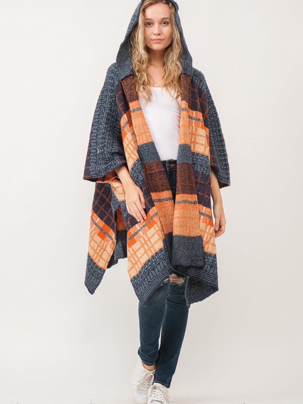 Raj Carrie Hooded Ruana features a vibrant teal and orange plaid pattern